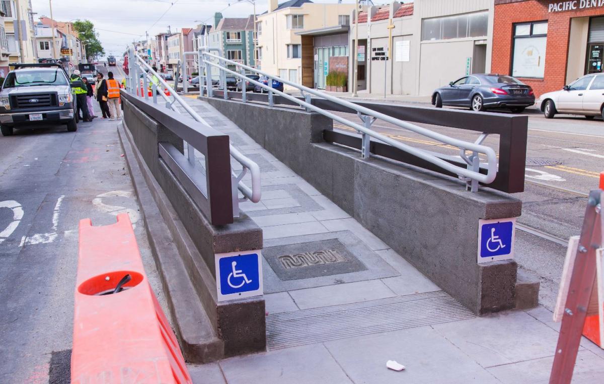 Eastbound N Judah platform at 28th Avenue with new ADA boarding ramp and accessibility signage