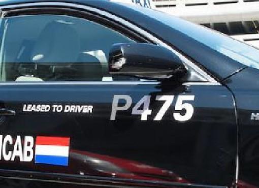 Taxi image with P in front of the Medallion number 475.