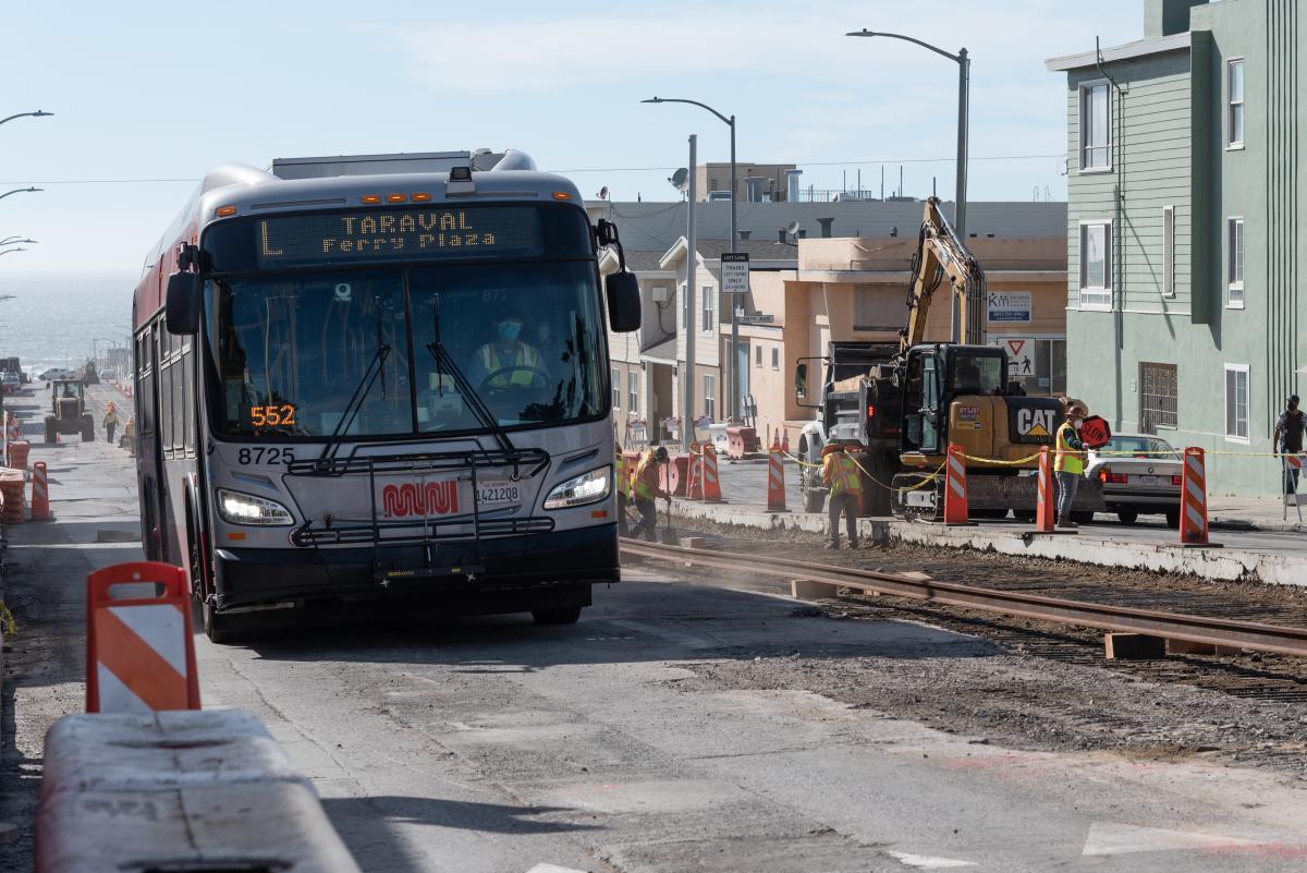 L Taraval Bus passing by construction on Taraval