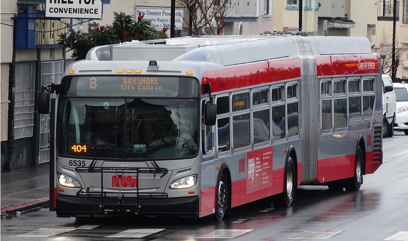 An 8 Bayshore Muni bus traveling on San Bruno Avenue.