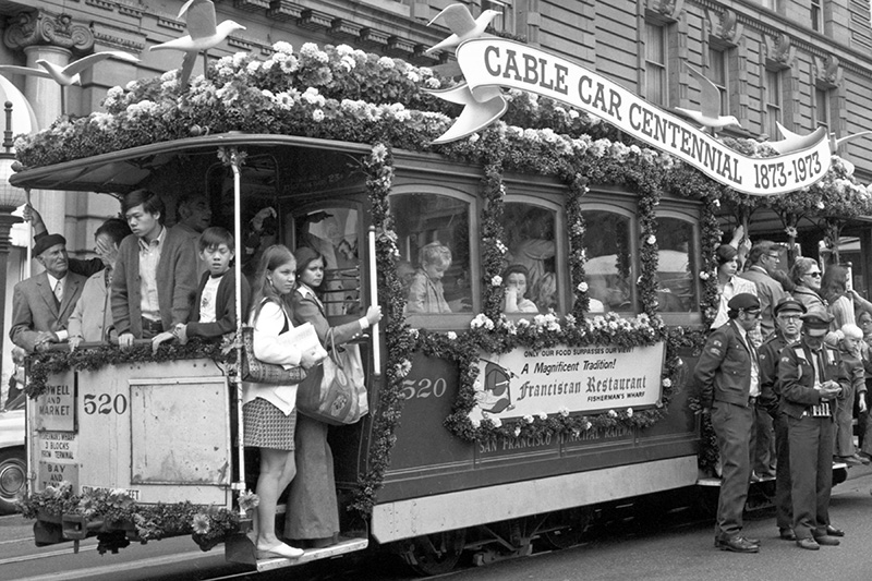 decorated cable car with passengers