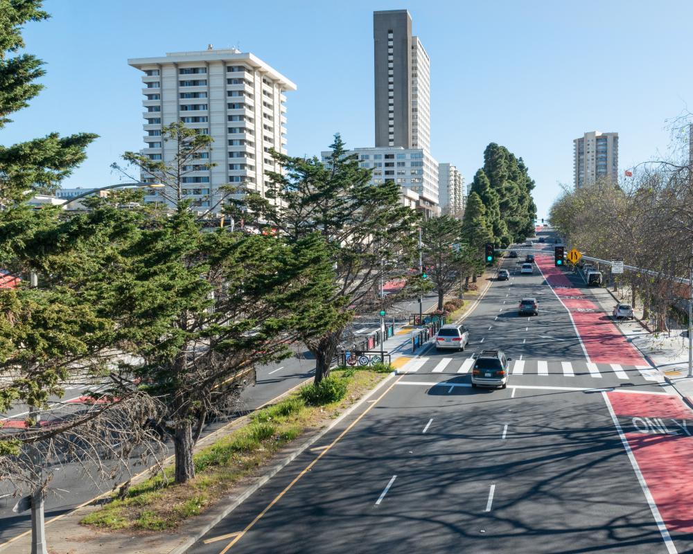 Geary at Buchanan Street after the Geary Rapid Project. In addition to red transit lanes, a new crosswalk was installed to help reconnect the Fillmore, Japantown and St. Francis Square neighborhoods.