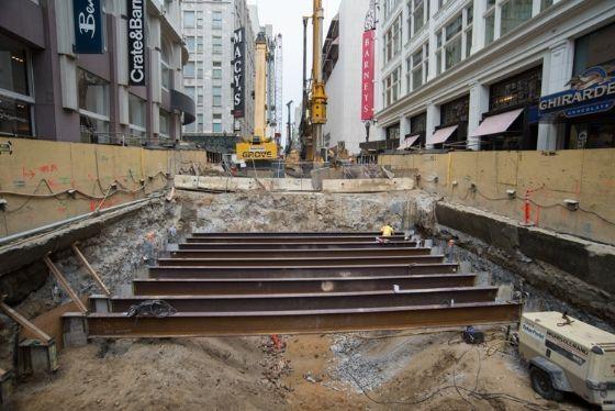 Between Ellis and O'Farrell on Stockton Street, beams that span the width of the street have been installed.