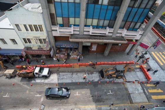 On Washington Street East of Stockton, fire hydrant work continues.