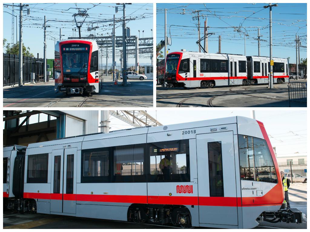 New Muni light rail vehicles displayed in train yard, showing red and white exterior design from multiple angles.