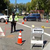 Traffic control personnel managing Union Street crosswalk during Central Subway construction work.