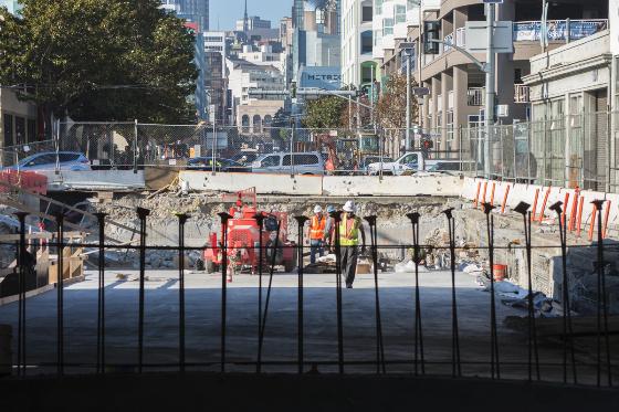 Construction crew working on subway portal between Harrison and Bryant streets on 4th Street.