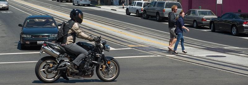 Motorcycle crossing an intersection.