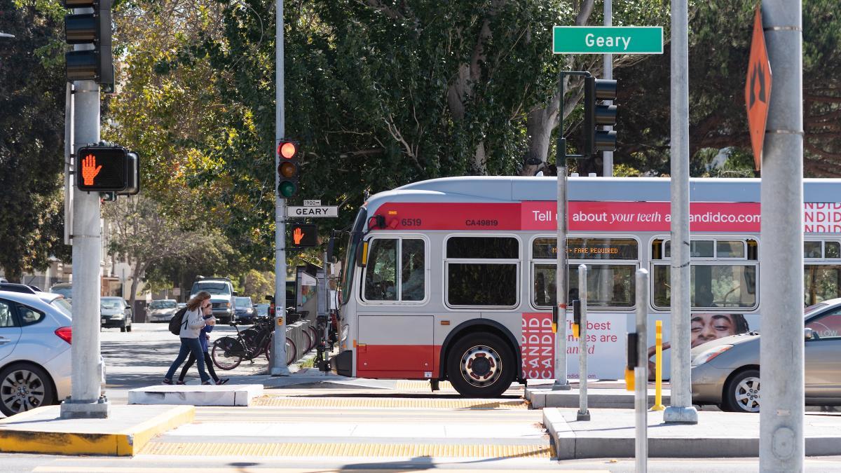 Image of 38 Geary bus and new improved crosswalks on Geary Boulevard