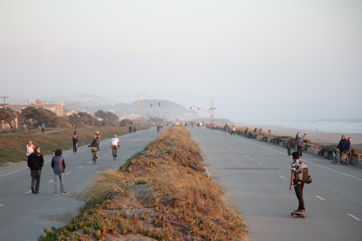 People walking, biking, and rolling along the Upper Great Highway when closed to vehicles People walking, biking, and rolling along the Upper Great Highway when closed to vehicles