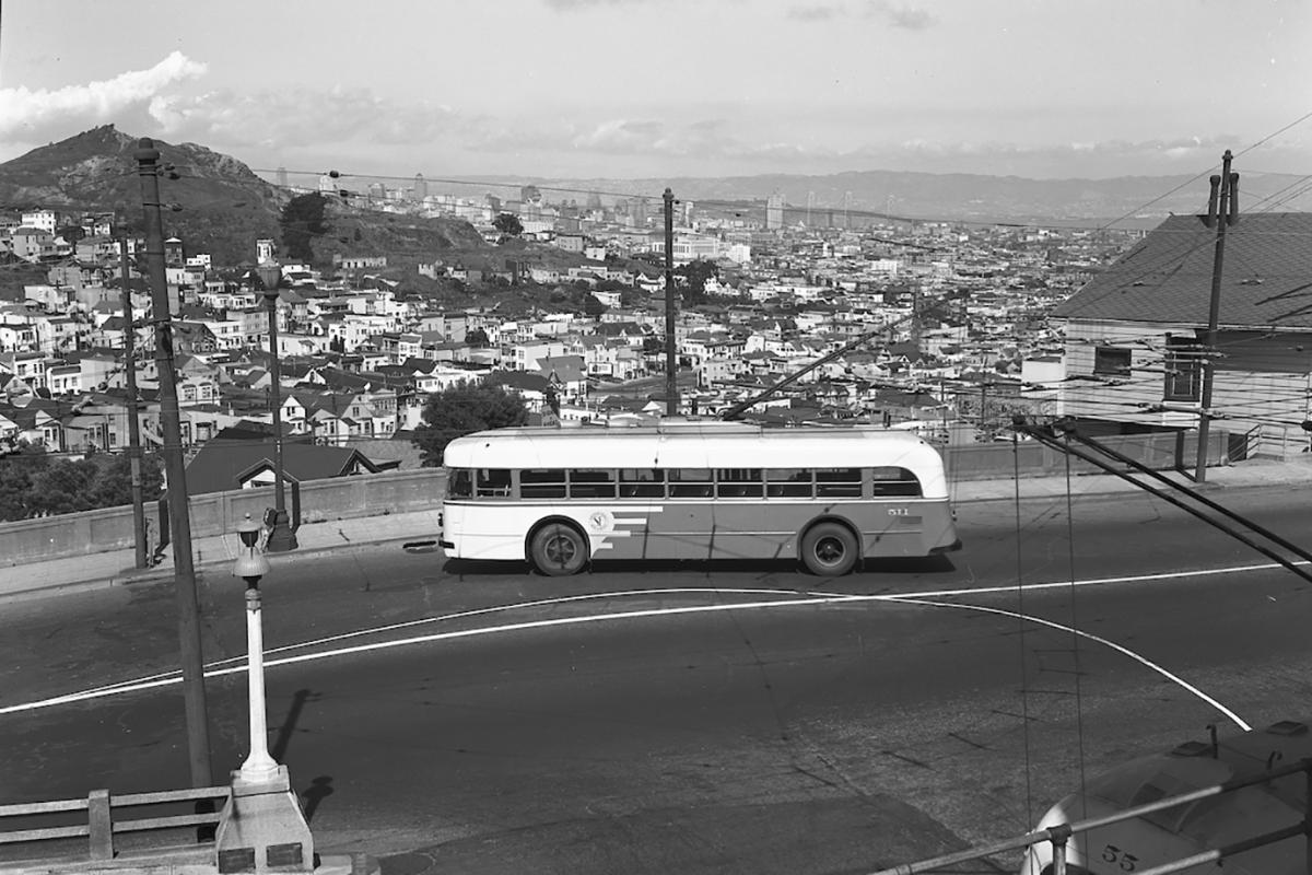 33 ashbury coach with city skyline in background, 1947