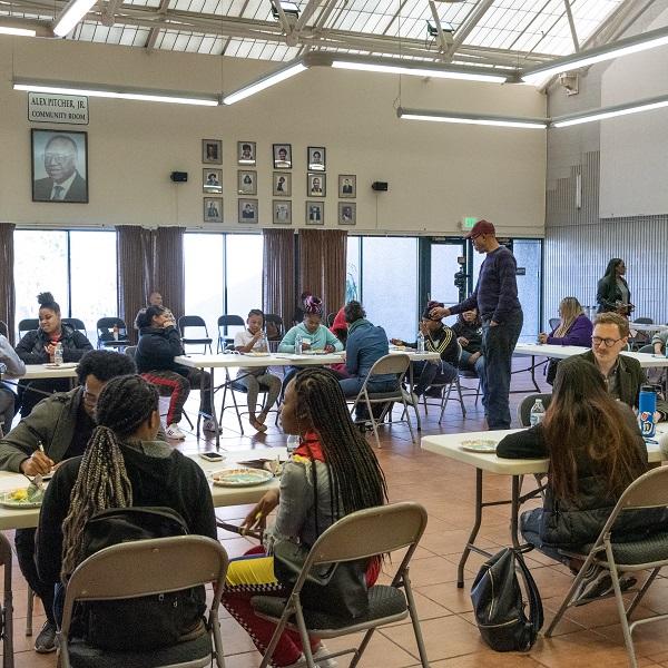 Photo of students and SFMTA staff in a Youth Summit workshop