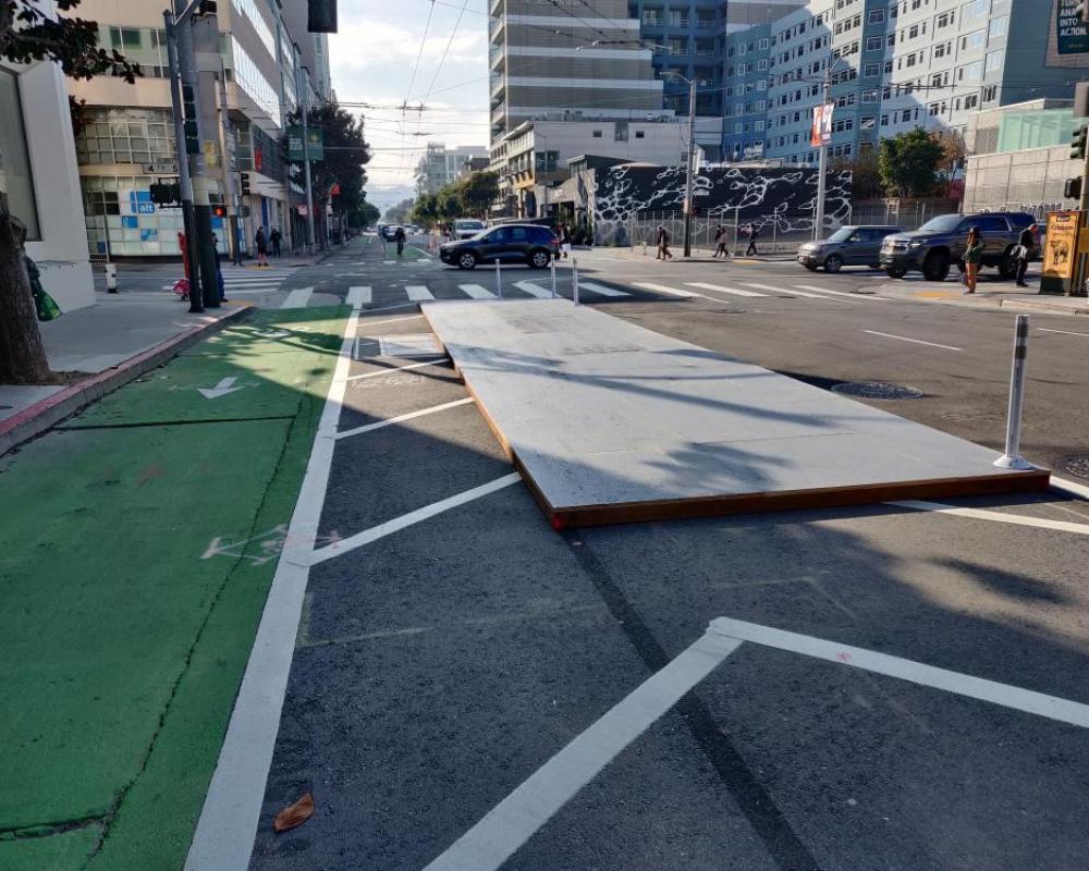Temporary island and protected bikeway