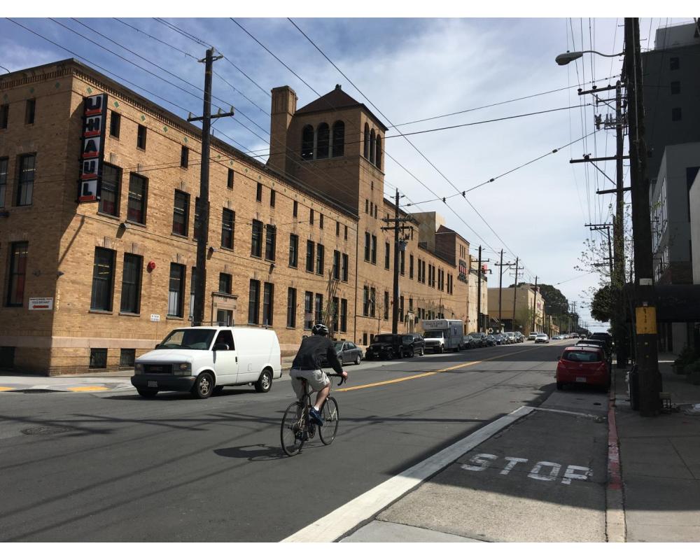Bryant Street before: a bicyclist travels along southbound Bryant street