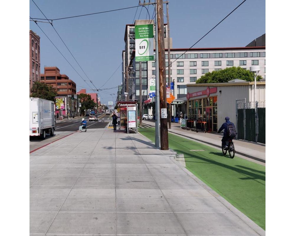 Photo of protected bikeway and bus boarding area near Catrain Station - September 2020
