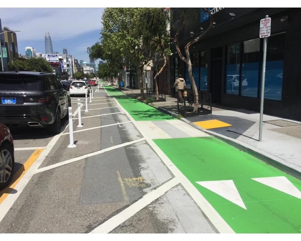 Protected bike lane on Folsom near 8th Street (2018 near-term improvements)