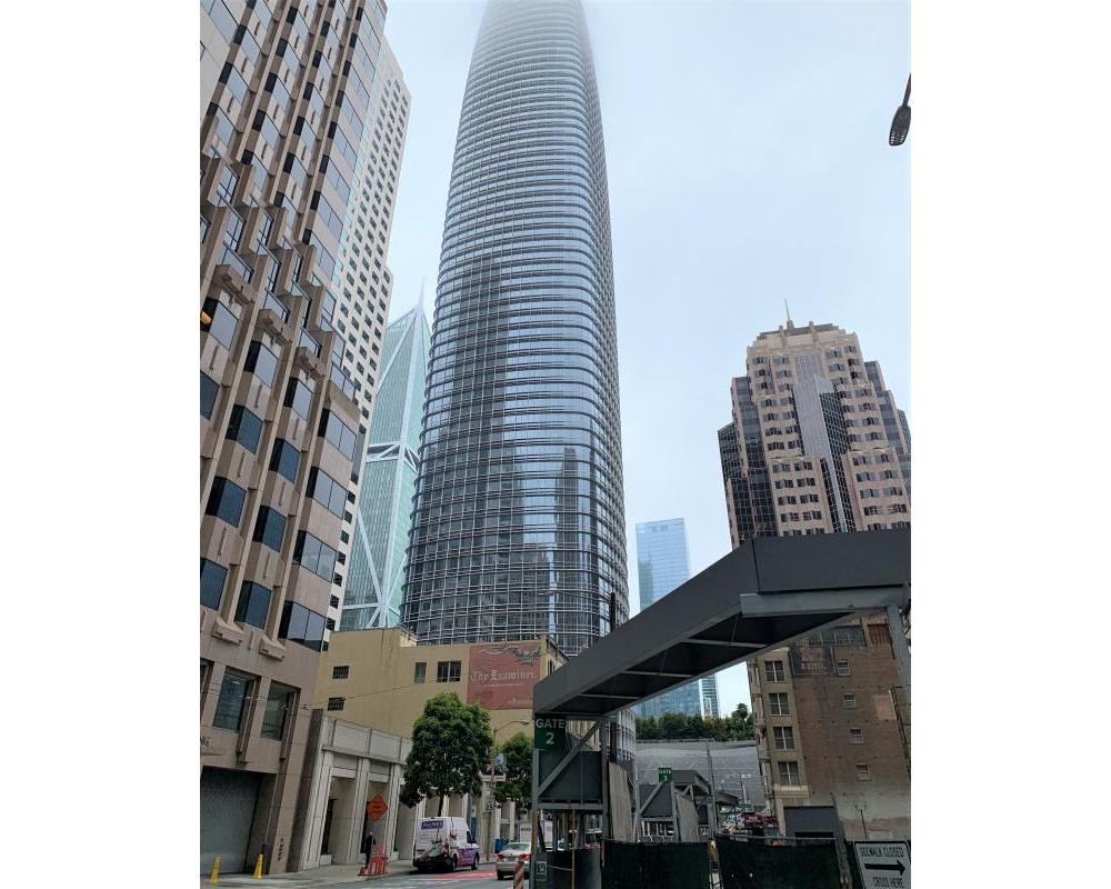 View of Salesforce Tower looking south from 1st Street, with construction at the Oceanwide Center at 50 1st Street