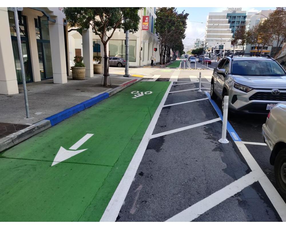 Protected bikeway with blue zone