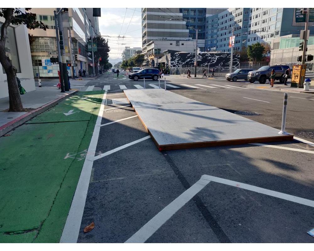 Temporary island and protected bikeway