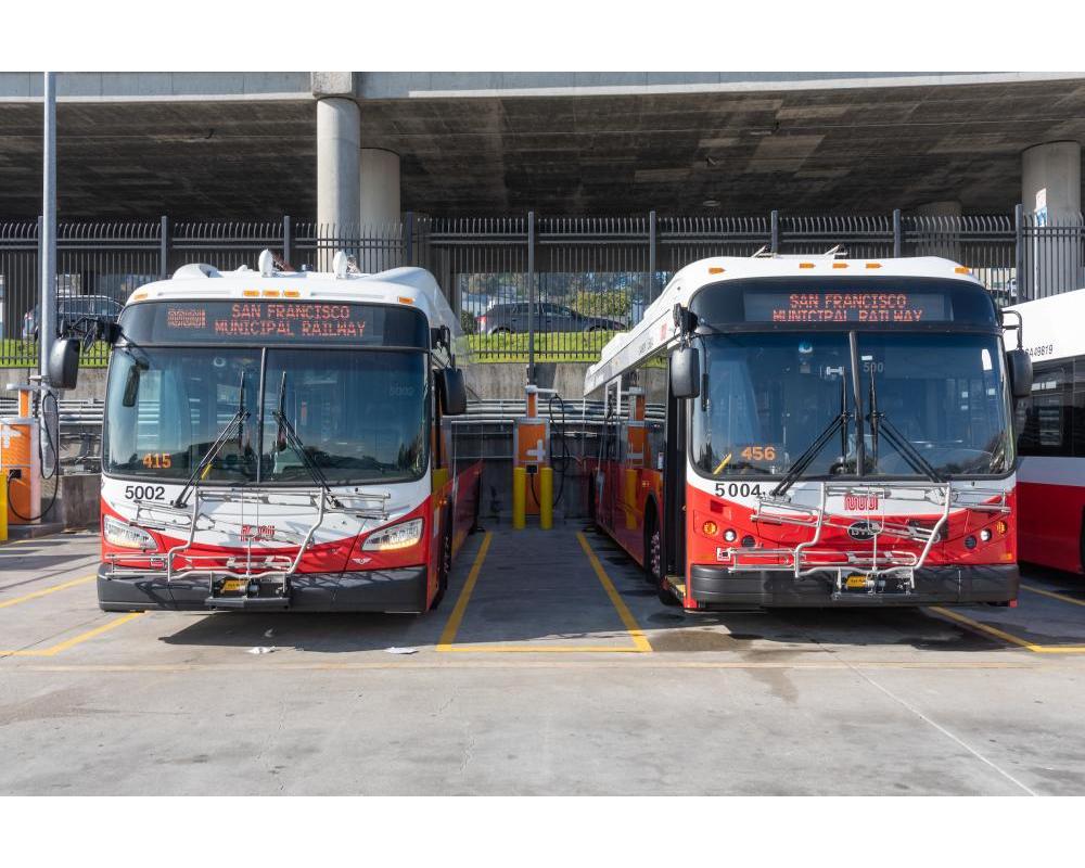 New Flyer (left) and BYD USA (right) Battery Electric Buses at Woods Stations 