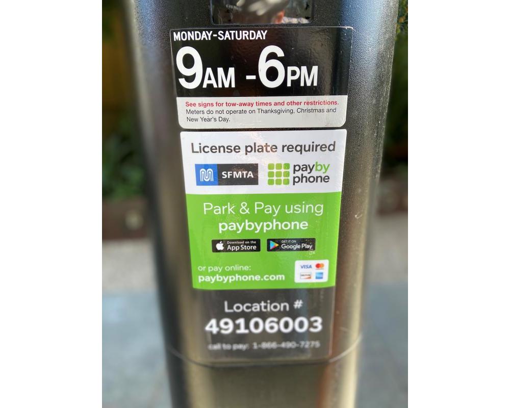 Parking meter decal showing payment information