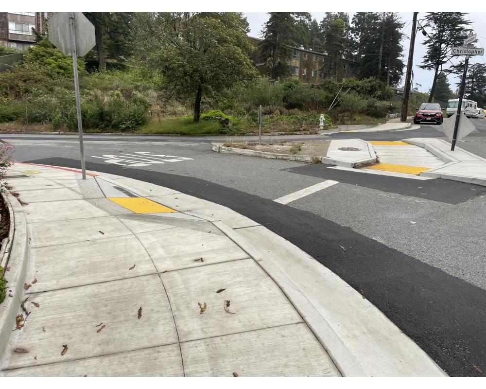 crosswalk and curb ramps at intersection on clarendon avenue and christopher drive 
