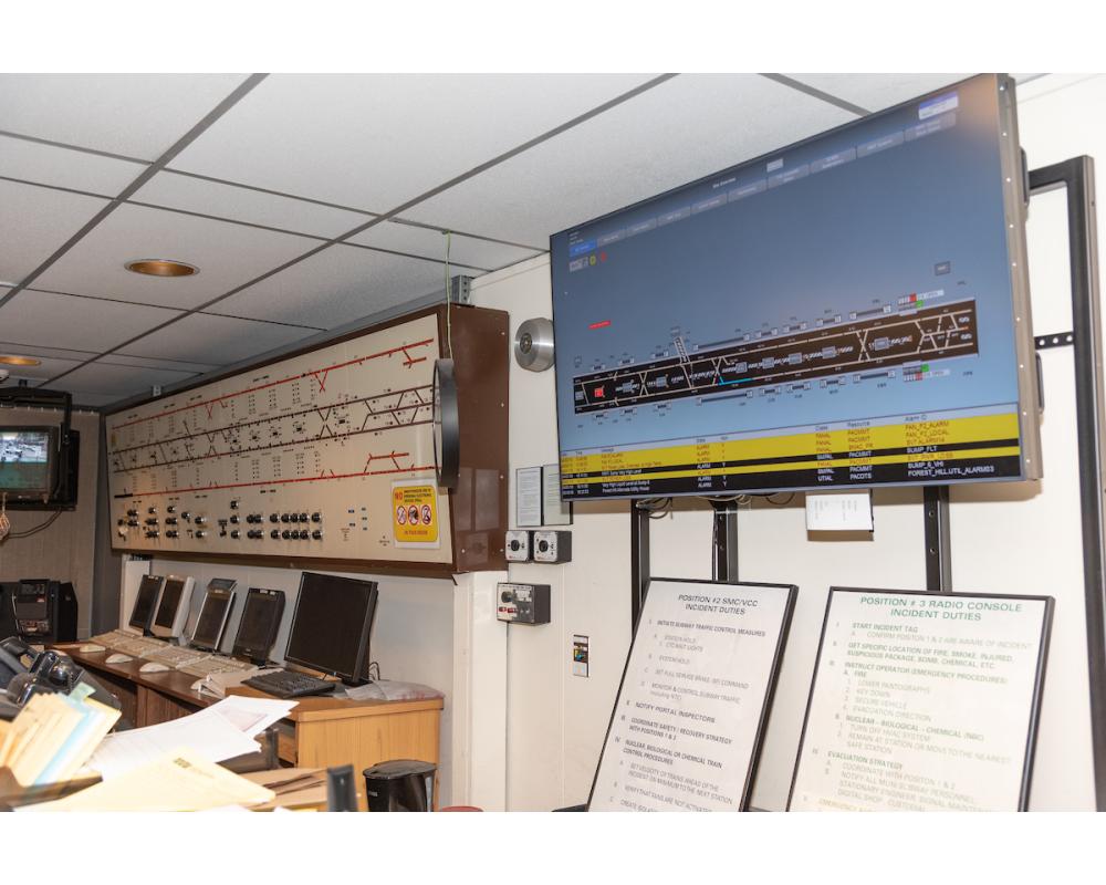 Photo of computer screens showing Muni train movements