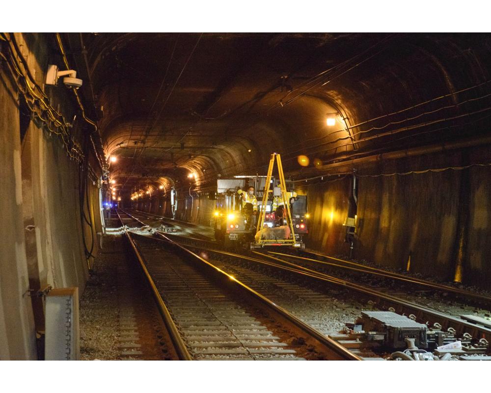 Motive Power crew performing laser survey in a tunnel. 