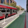Photo of protected bikeway between 7th and 8th streets with Muni bus driving by - September 2020