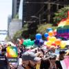 Photo of Pride Parade with SFMTA logo