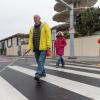 Image of Lou Grosso, a blind member of the Geary Community Advisory Committee, crossing the street at the new Buchanan crosswalk