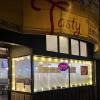 Decorative lighting in the window of Tasty on Geary.