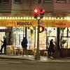 Decorative lighting above the awning for Hummus Bodega on Geary.