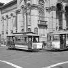 A unique sight: a Muni bus, a cable car, and streetcar, all posed together at the corner of Jackson Street and Fillmore in 1948.