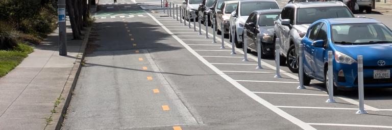 Two-way protected bikeway and floating parking on Judson Ave.