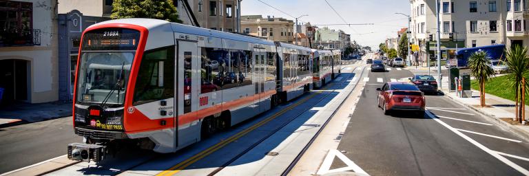 To prepare for the return of rail service, an operator trains in an L Taraval train on the new tracks along Taraval