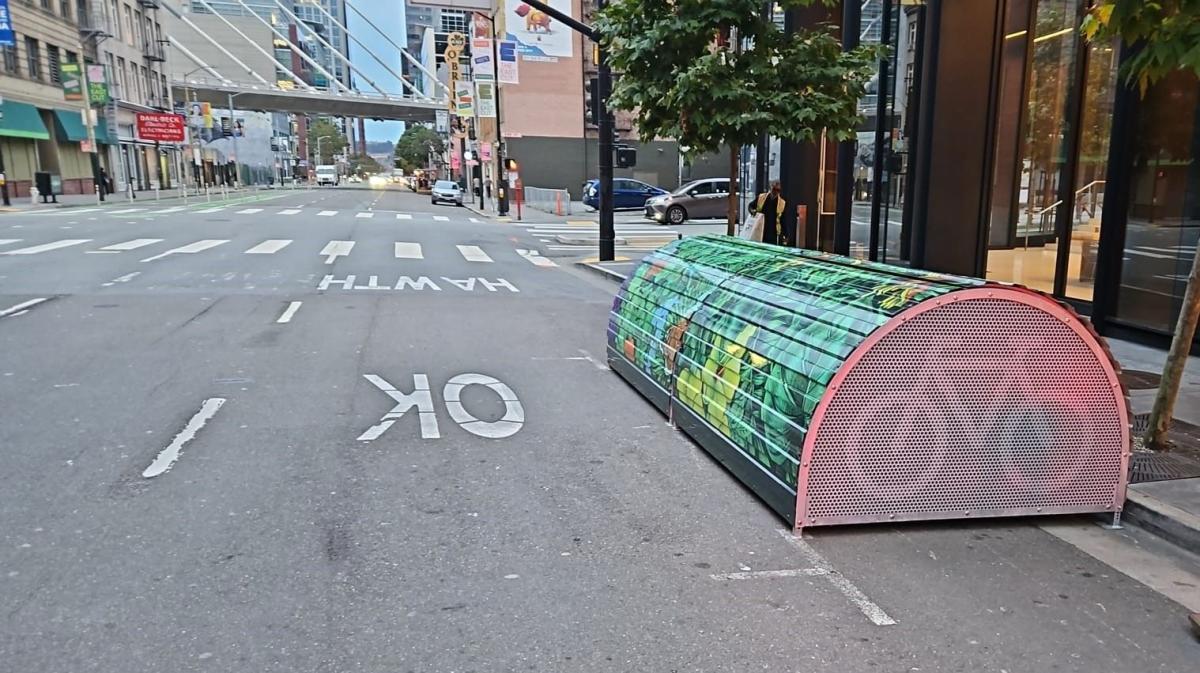 SFMTA’s new bikehangar at Howard & 2nd streets, looking east, in the parking lane on the south side of the street.