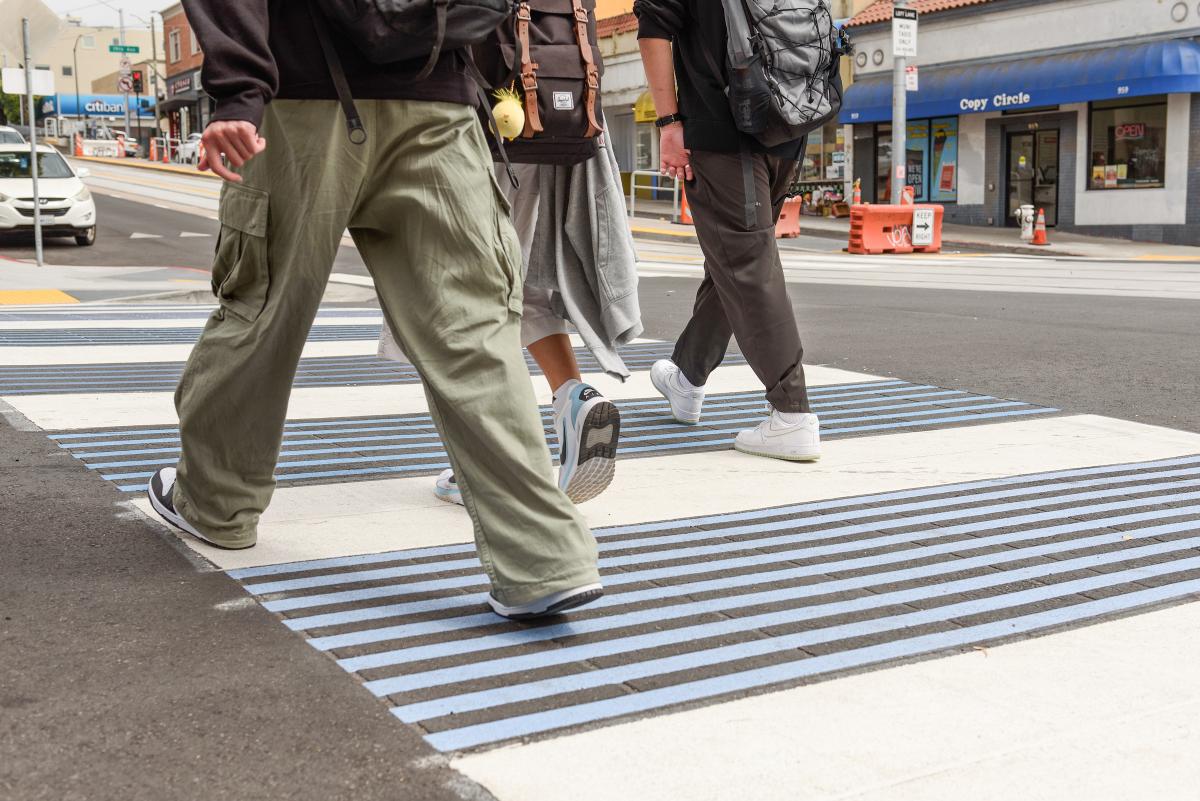 People crossing an intersection.