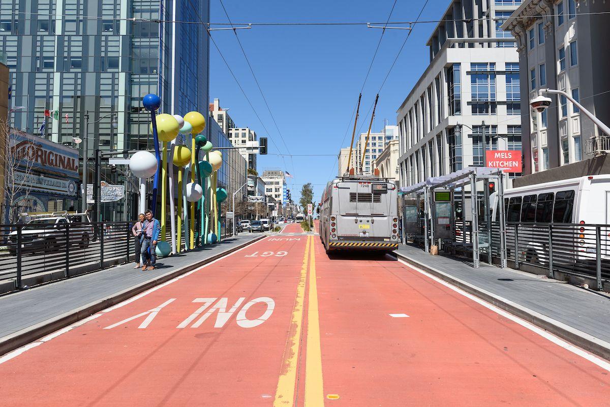 Shot of a 49 Van Ness driving north on Van Ness Avenue using one of the red, transit-only lanes.