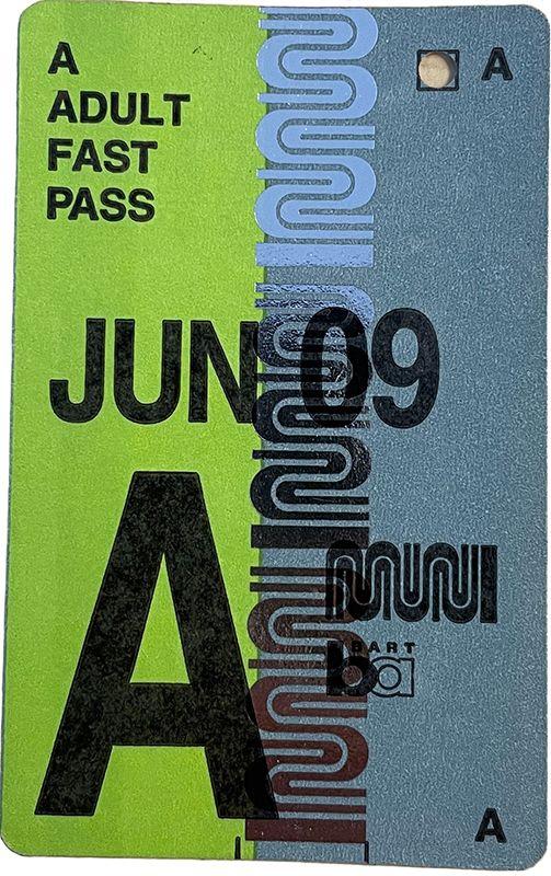 Image of an Adult Fast Pass that's green and blue and valid for June 2009.