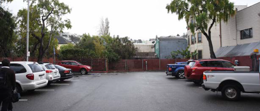 SFMTA Parking Lot at 455 Castro Street with parked cars.