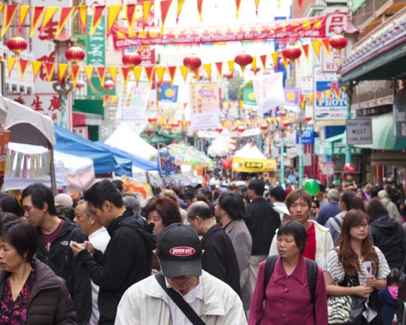 A crowded street at the Autumn Moon Festival in Chinatown.