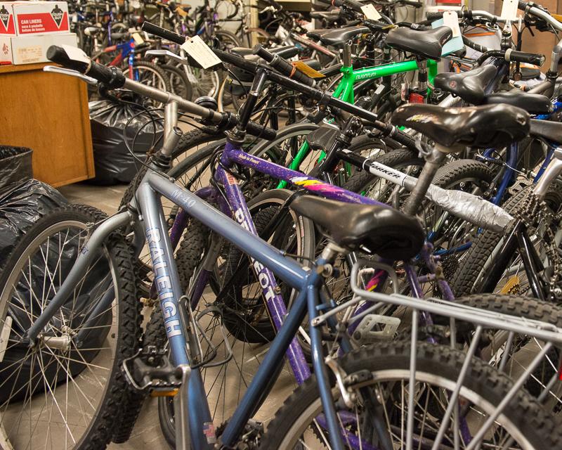 Pile of bicycles in Muni lost and found office.