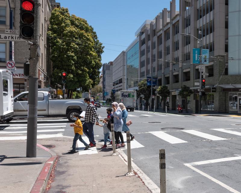 Pedestrians crossing Golden Gate Avenue At Larkin Street 