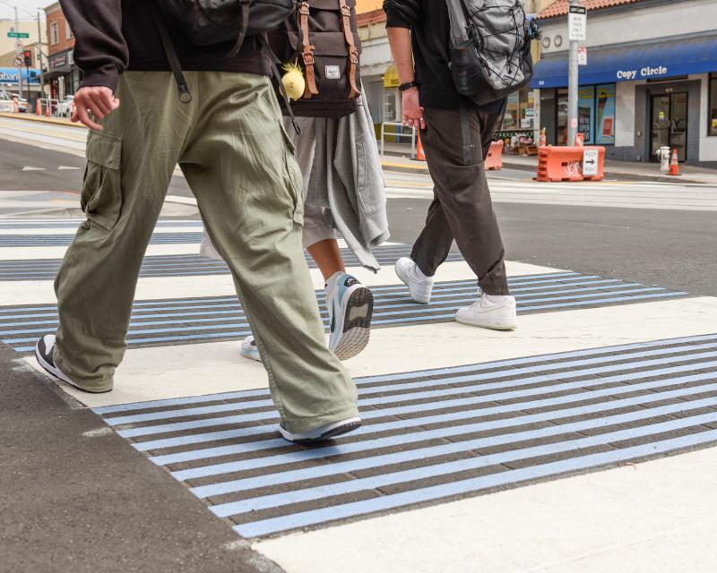 People crossing an intersection.