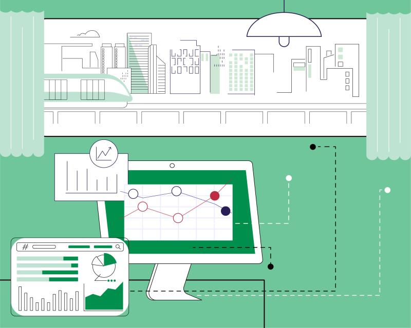 A computer displaying data visualization on a desk with a window showing a skyline of a modern city.