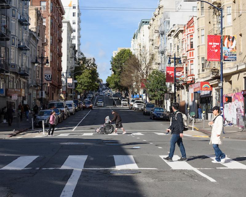 Photo of people walking in a crosswalk across Hyde Street