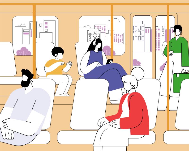 Passengers ride both seated and standing inside a metro train with a view of a modern city out the windows.