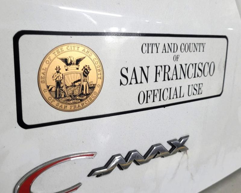 Official use sticker on a city vehicle.