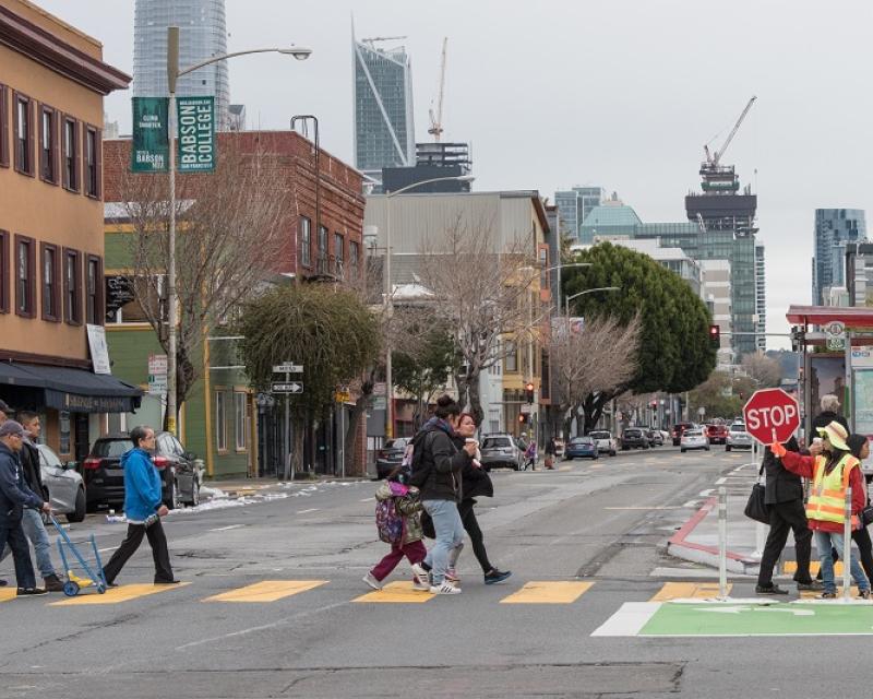 People crossing the road.